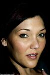 Enticing MILF Claire Dames flaunts her cleavage and inked feet fully clothed