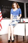 Hot teacher Natasha Nice slides her panties aside after baring her boobs