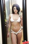 Hot gf in sexy white lingerie ensemble lays back and proceeds to masturbate