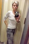 Czech lady Kathy White taking selfies in the mirror while stripping