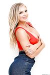 Hot blonde Alison Avery strikes great SFW poses in a denim miniskirt