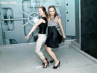 Fully clothed girl dance and get soaking wet during sprinkler malfunction