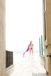 Amazing wet babe Remi showing that beautiful body on the beach