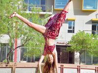 Amateur girl Mandy does a handstand out in public with no panties on