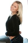 Hot MILF Kendra Rain peels her tight jeans & fondles her naked big tits