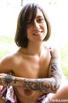 First timer Liandra Dahl parts her twat after getting naked in front of window