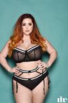 Plump British redhead Lucy Vixen flaunts her all natural phenomenal boobs