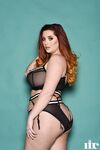 Plump British redhead Lucy Vixen flaunts her all natural phenomenal boobs
