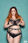 Plump British redhead Lucy Vixen flaunts her all natural phenomenal boobs