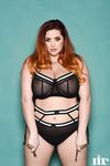 Plump British redhead Lucy Vixen flaunts her all natural phenomenal boobs