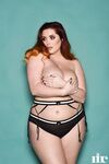 Plump British redhead Lucy Vixen flaunts her all natural phenomenal boobs