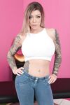 Inked MILF Karma Rx exposes her huge boobs and fantastic butt in a solo