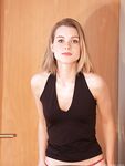 Dirty blonde model Zetta touts her bare ass after getting naked