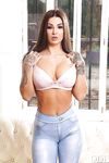 Hot solo girl Susy Gala flaunts her phat ass as she strips to her high heels