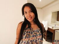 Pinay chick Corazon cups her great tits while having sex with a foreigner