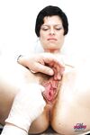 Short haired mature brunette with ample ass gets examed by gyno