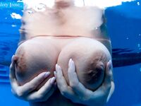 Valory Irene and her lesbian gf show off naked bodies underneath the waterline