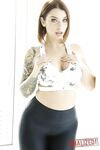Tattooed hottie Ivy Lebelle shows her curvy body and stretches her butt