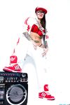 Extravagant bad girl Christy Mack poses in sexy Hip-Hop style clothing