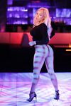 Attractive blonde Luna Star stripping out off her black dress showing her body