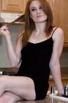 Horny housewife Lucy Fire tries out a sex machine on her tattooed pussy
