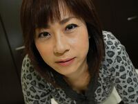 Asian MILF Mari Teramura getting naked and exposing her juicy slit