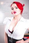 Stunning redhead teacher Jasmine James displaying her curvy body in class