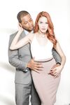 Sexy redhead Amarna Miller strips her classy clothes to spread in heels
