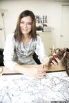 Amateur brunette teen Cece Stone undresses on a desk to show shaved pussy