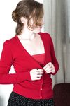 Natural redhead Ana Molly grabs her bare ass after exposing her naked bush