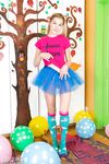 Young looking girl sports a no panty upskirt before getting nude amid balloons