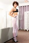 European babe Zoey King removes tight dress to pose in hot stockings
