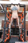 Fit MILF pornstar Rachel Starr sliding spandex shorts over phat ass in gym