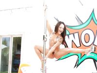 Latina teen Holly Hendrix showing off bare ass before working stripper pole
