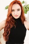Model with red wavy hair Sophia Blake undresses & poses in sheer tights