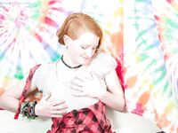 Redhead punk chick Isadora fondles all natural boobs and fingers hairy twat