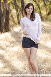 Hottie with hard nipples Sandy disrobes in the woods to crawl naked outdoors