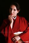 Japanese model Yuki Tsukamoto fondles her firm boobs as she gets naked