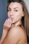 Beautiful teen Josephine B bares her great tits and twat before blowing a kiss
