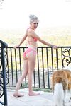 Thin teen Larissa frees her sexy ass from jeans shorts to model nude