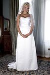 Blonde bride Katie Summers doffs her wedding dress & poses topless in lingerie