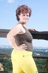 Granny with big tits Manyika gets fucked and jizzed by a young man outdoors