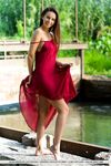 Beautiful teen Alisa Amore disrobes for nude solo poses near a dam