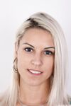 Platinum blonde amateur Beata reveals pussy piercing after getting undressed