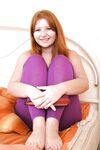 Redhead teen with massive jugs stripping and fingering her hairy twat
