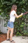 First timer Marina Rossi reveals her big naturals and juicy ass in the yard