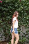 First timer Marina Rossi reveals her big naturals and juicy ass in the yard