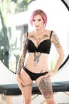 Punk girl Anna Bell Peaks takes off her black bra and panty combo