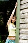 Petite amateur Marla strips naked outdoors to pleasure hairy vagina