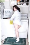 Big ass mature brunette Arden Delaney spreading her twat in a bathroom